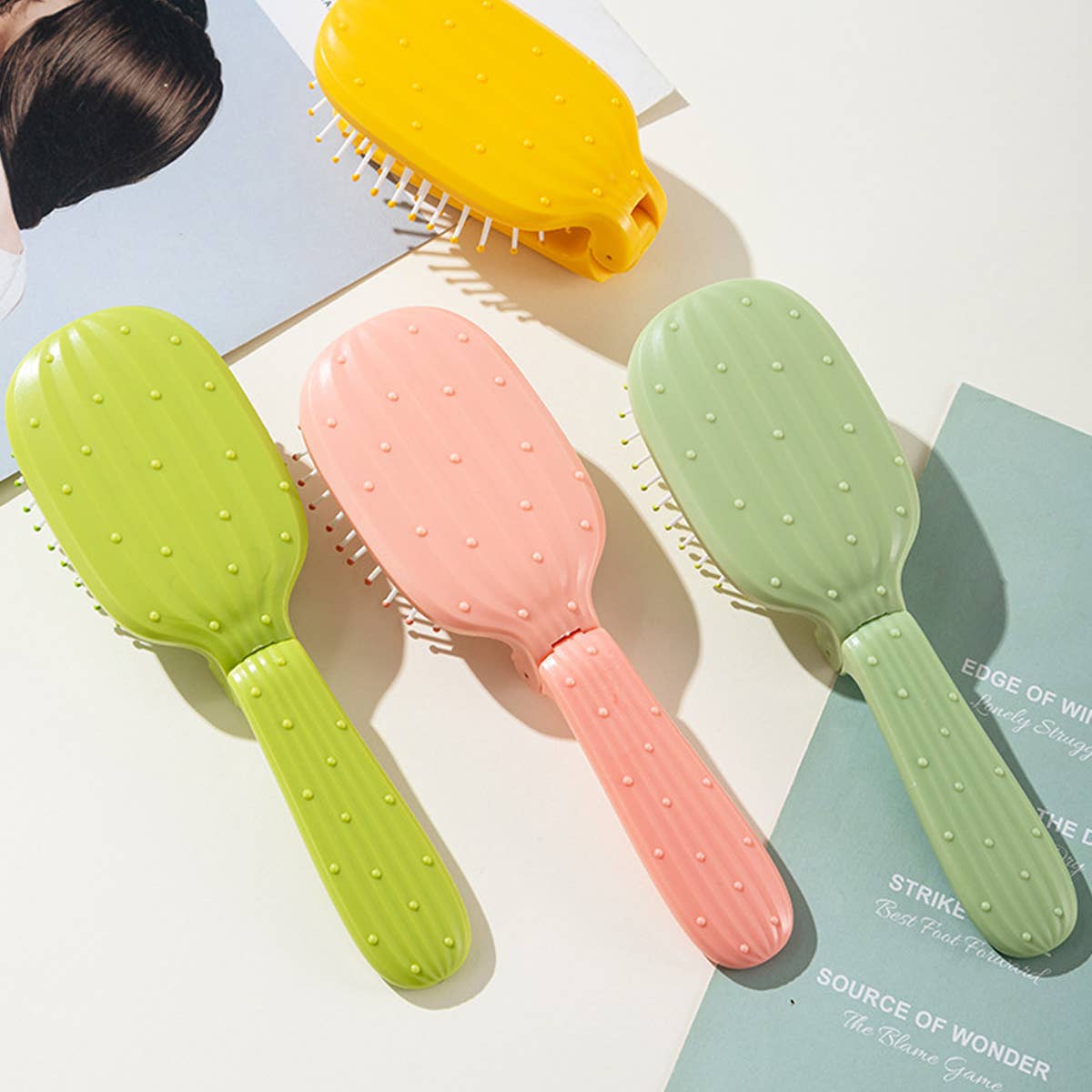 NEW CACTUS FOLDING AIR BAG COMB