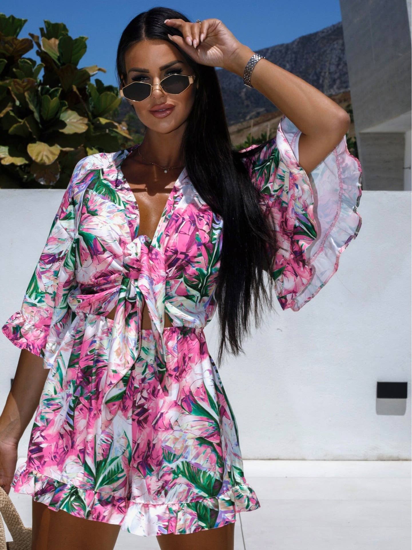 Zebra-print rotator cuff V-neck lace-up rompers