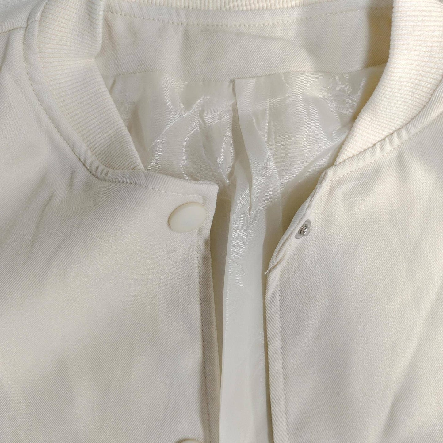 Round-neck single-breasted long-sleeved jacket