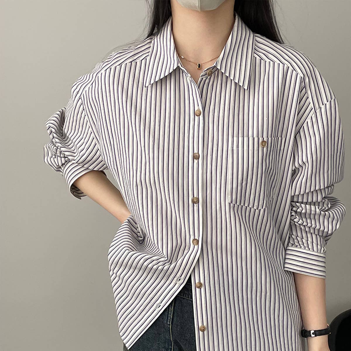 Wear a wide, slim, long-sleeved shirt