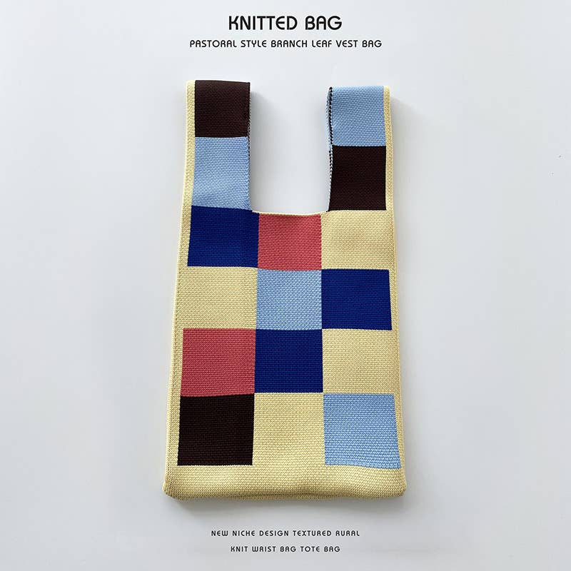 Heart-shaped color-blocked knitted handbag