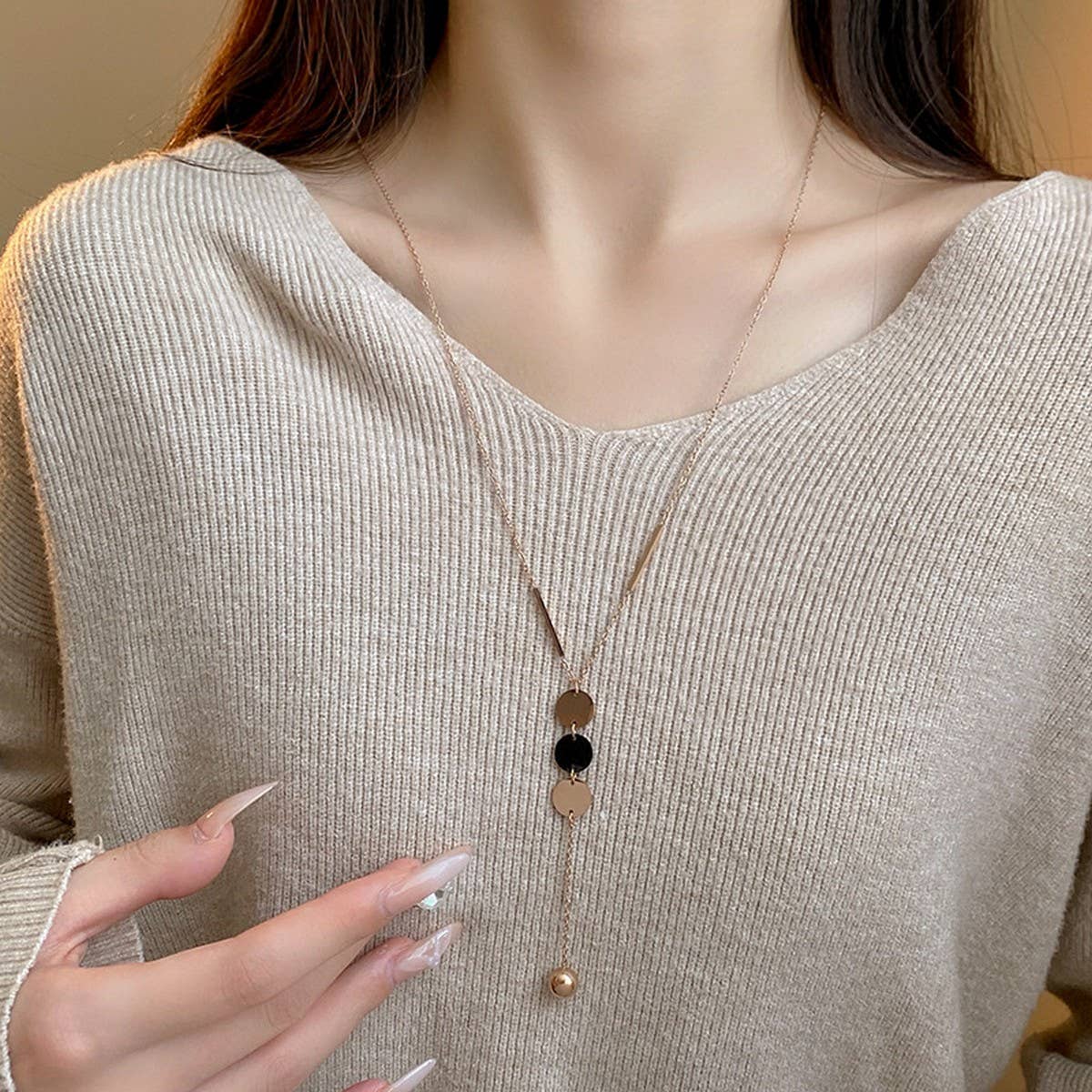 GEOMETRIC SEQUIN TASSEL NECKLACE
