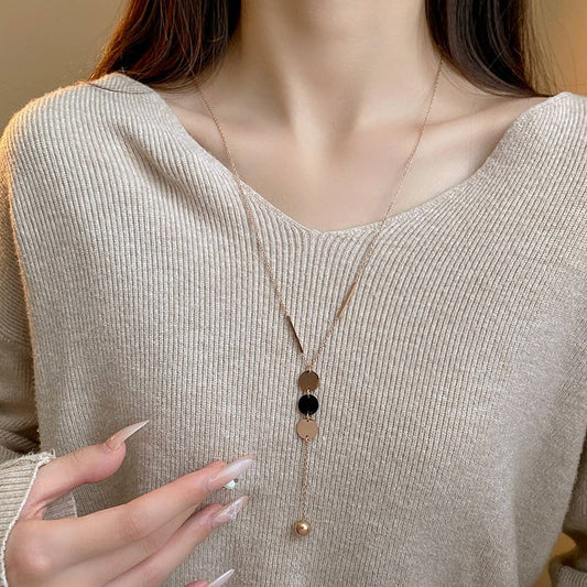 GEOMETRIC SEQUIN TASSEL NECKLACE