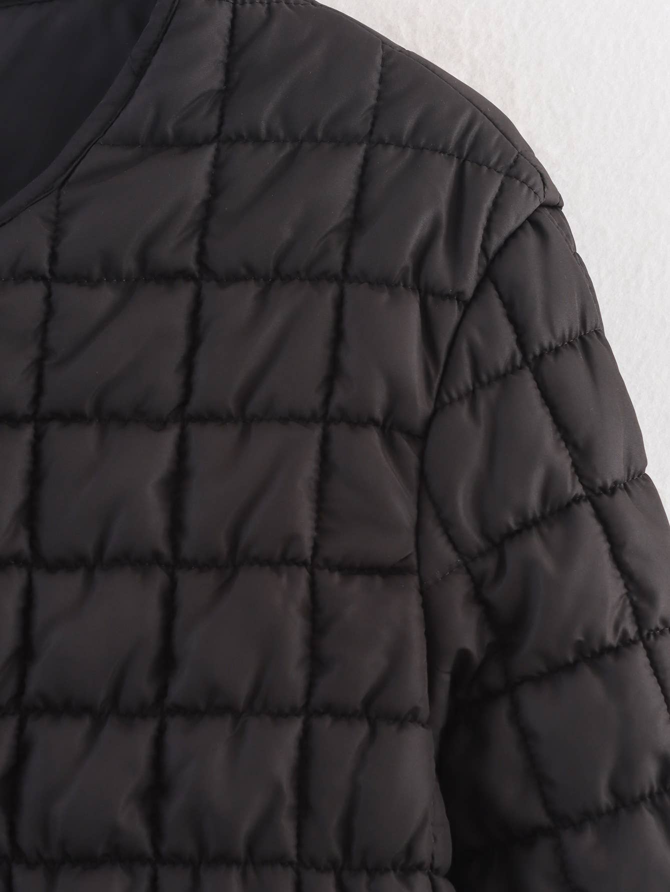 Short textured quilted three-dimensional coat