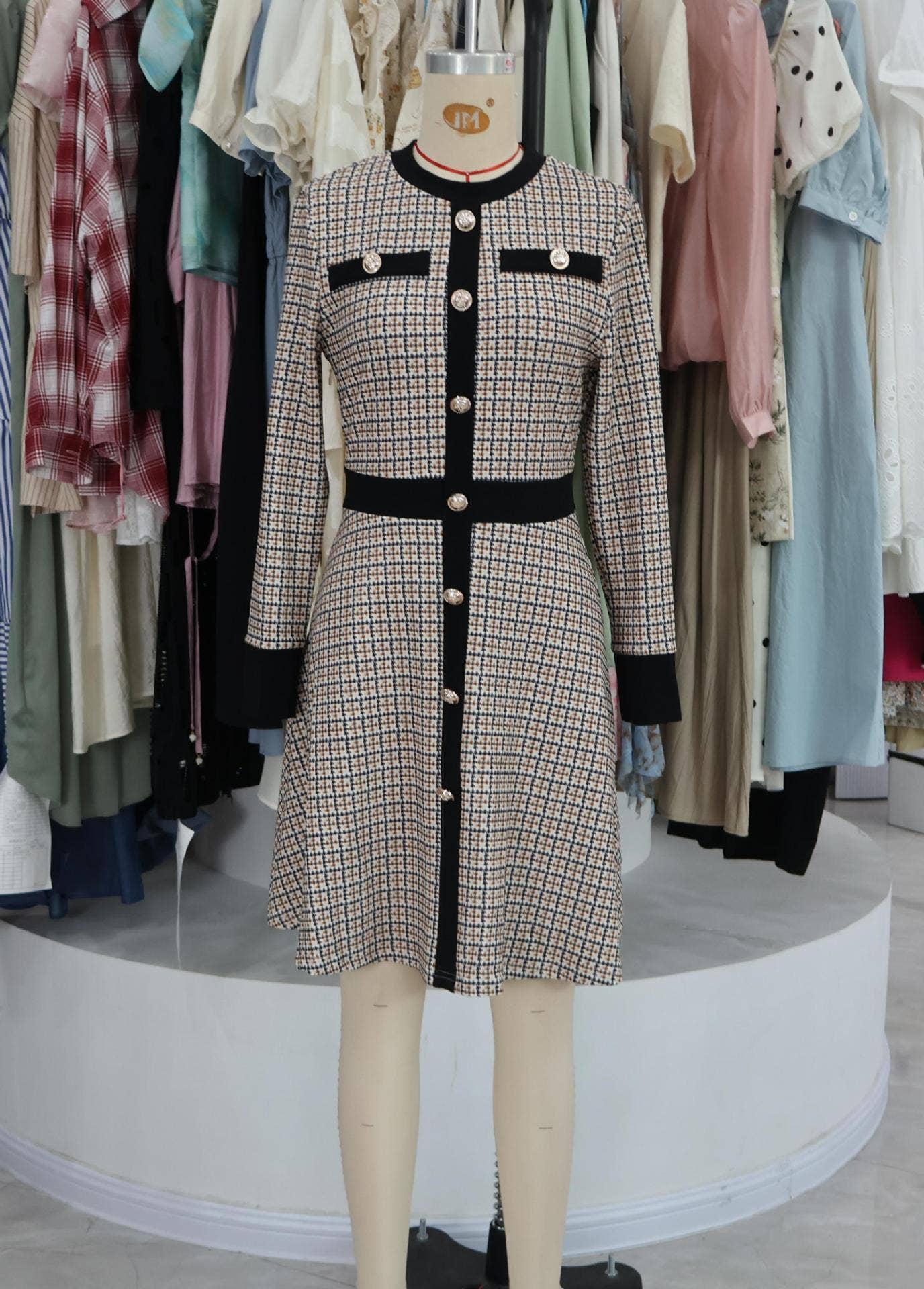 Long-sleeved knitted checkered button-down dress