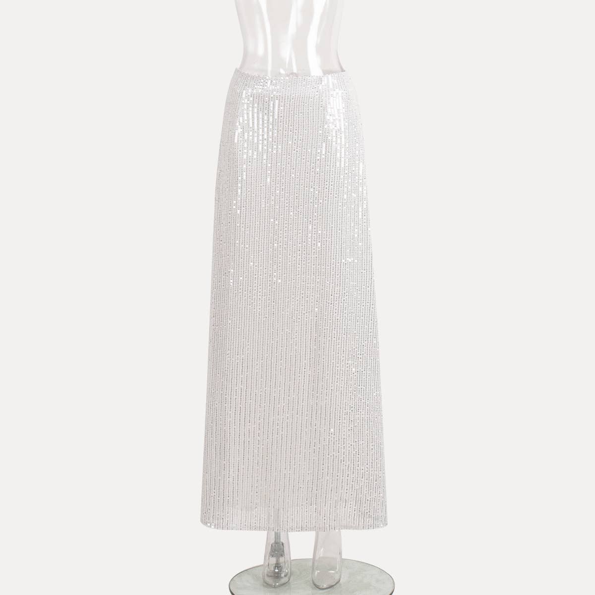 A long straight skirt in golden thread sequins