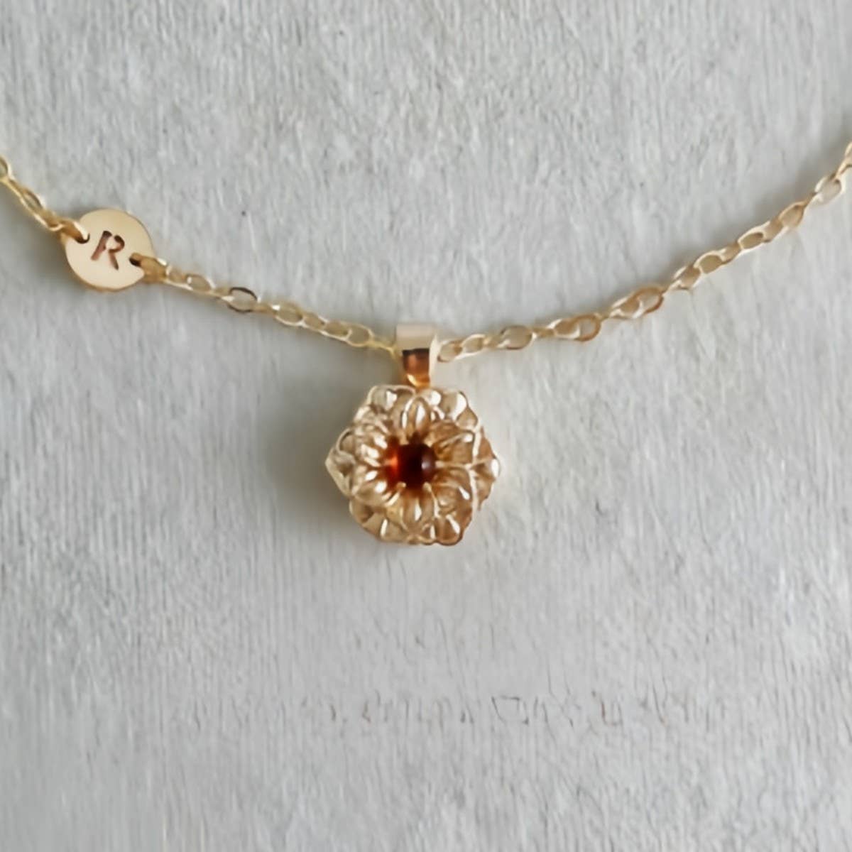 DECEMBER FLOWER ROTATING FLOWER LUCKY NECKLACE