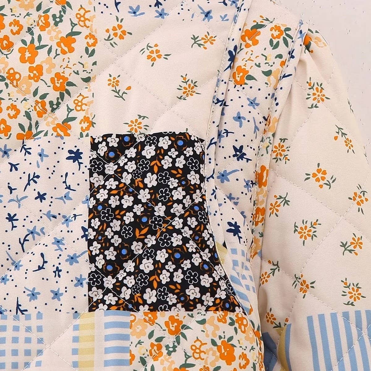 FLORAL PRINT PANELED BUTTON QUILTED JACKET