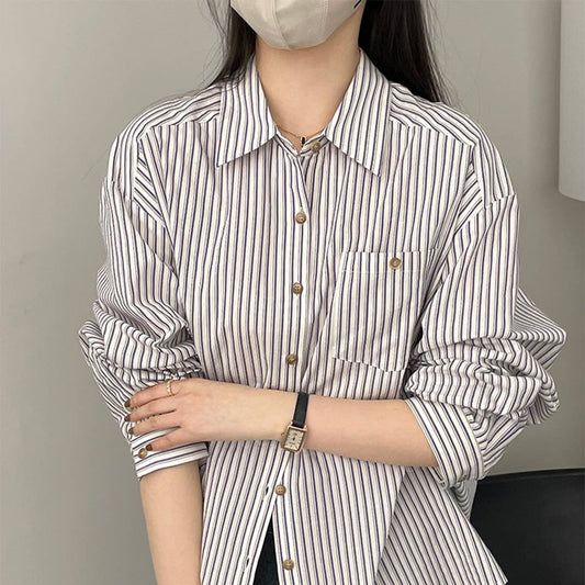 Wear a wide, slim, long-sleeved shirt