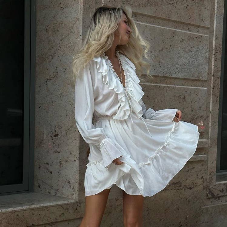 Ruffled dress with flared sleeves