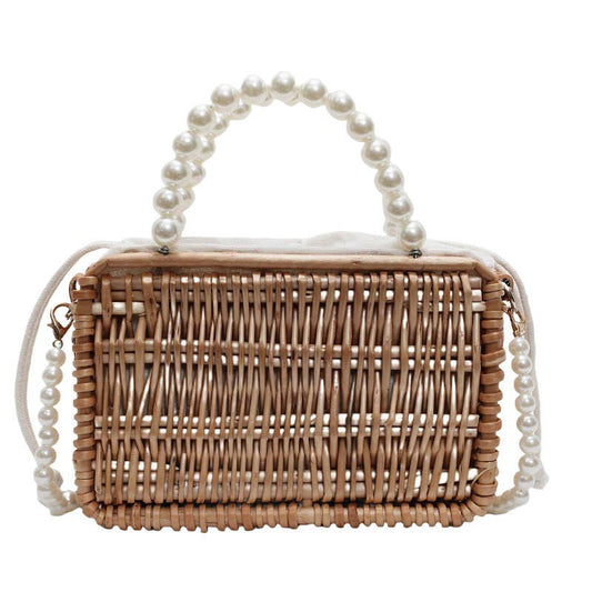 Fashionable perforated beach basket bag