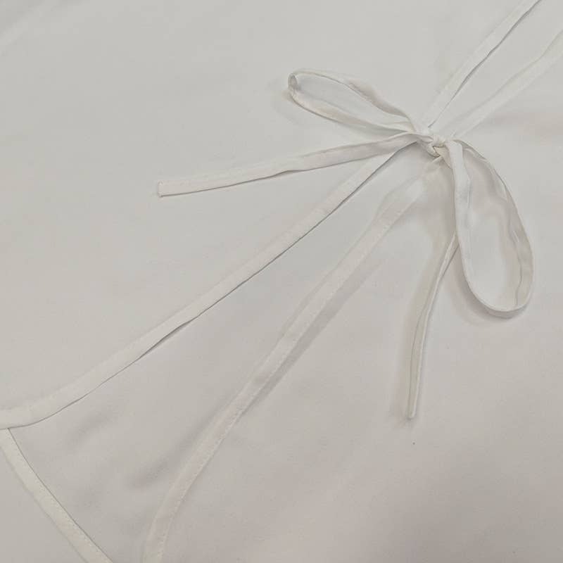 Stylish lace-up design shirt with ruffled edge