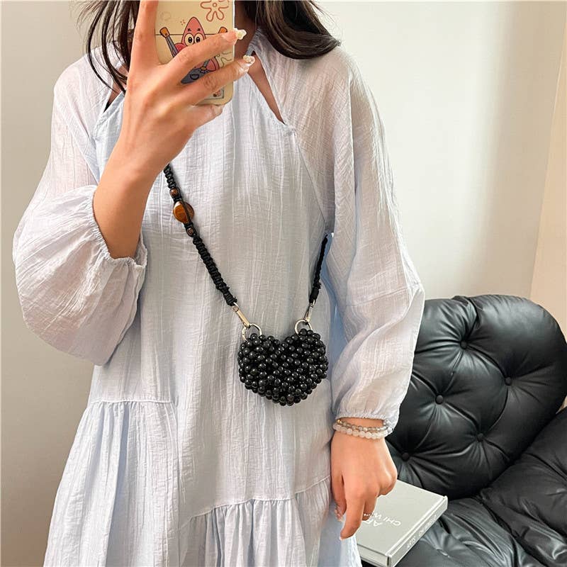 Hollowed-out and colorful beaded crossbody bag