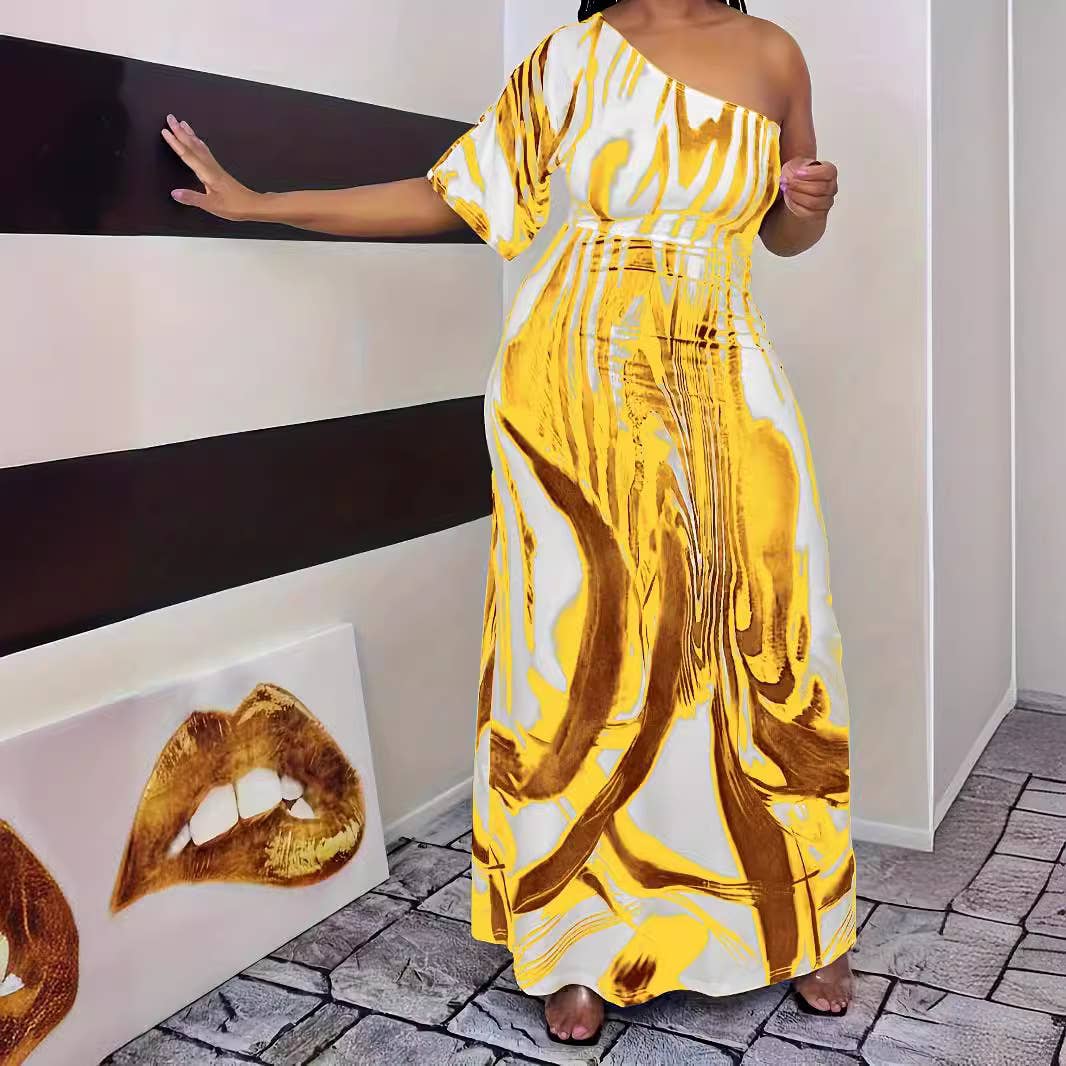 PRINTED ONE-SLEEVED DRESS WITH SLOPING SHOULDERS