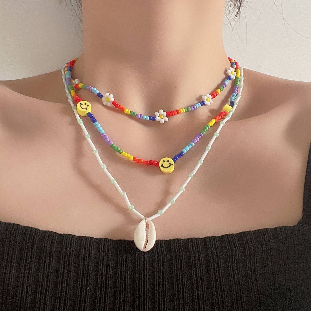 SHELL SMILEY DAISY BRAIDED NECKLACE