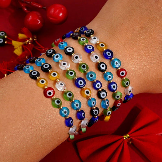 MIXED COLOR GLASS DISC EYE SMALL TASSEL BRACELET