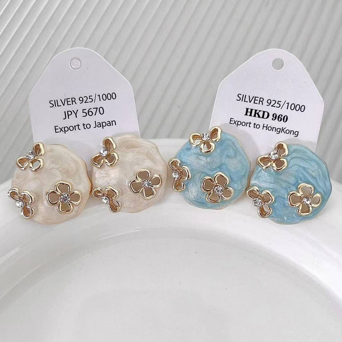 HOLLOW ZIRCON GEOMETRIC FLOWER EARRINGS