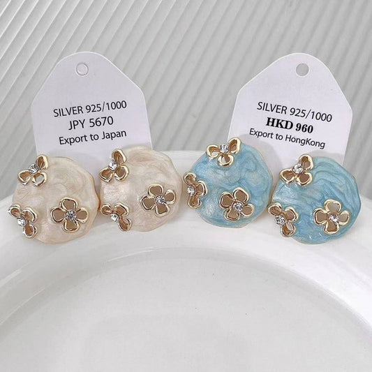 HOLLOW ZIRCON GEOMETRIC FLOWER EARRINGS