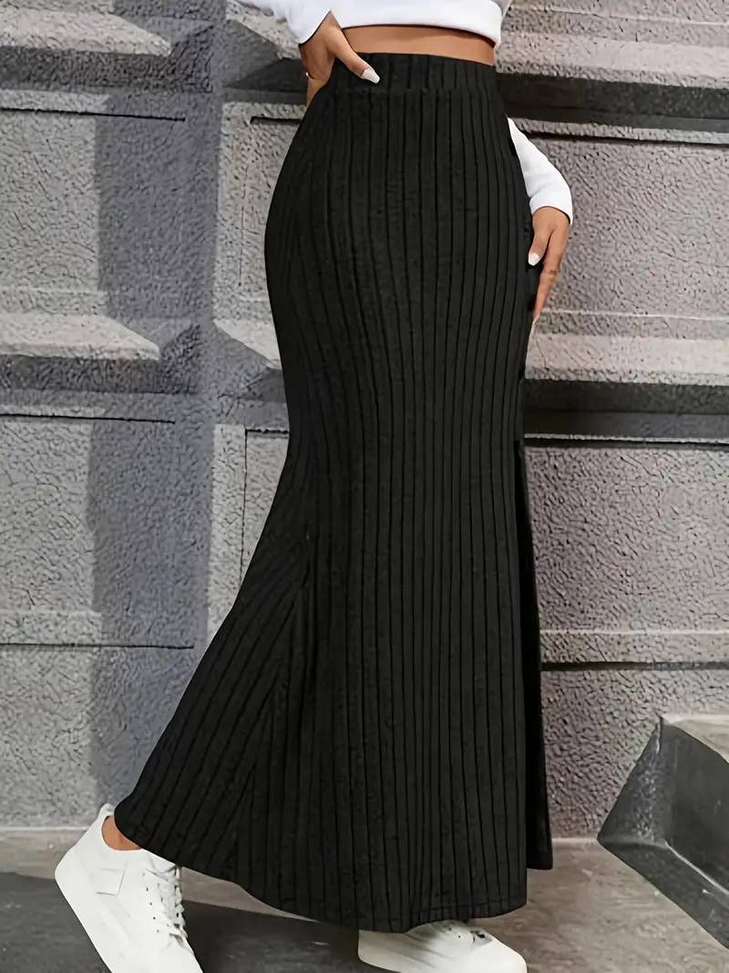 SLIT SLIT BUTTONS ADORN A DRAPED HIP SKIRT