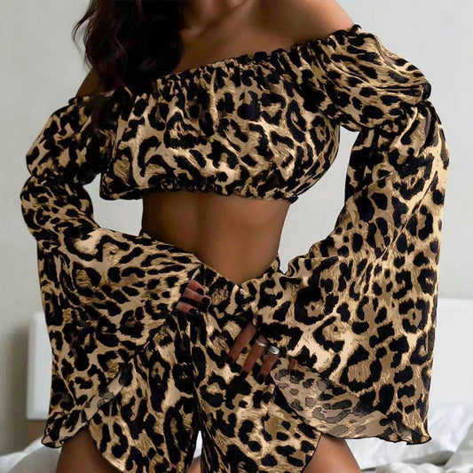 A one-shoulder top shorts and leopard print suit