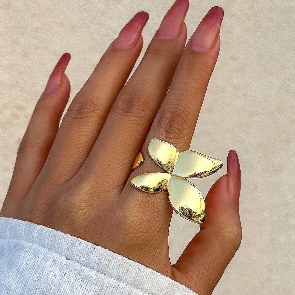 SIMPLE ASYMMETRICAL STATEMENT FRENCH RING