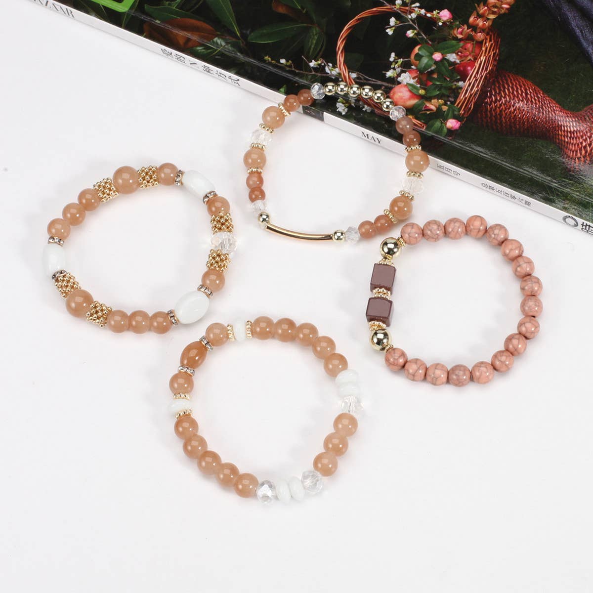 MULTI-LAYERED MARBLED BEADED ELASTIC CORD BRACELET