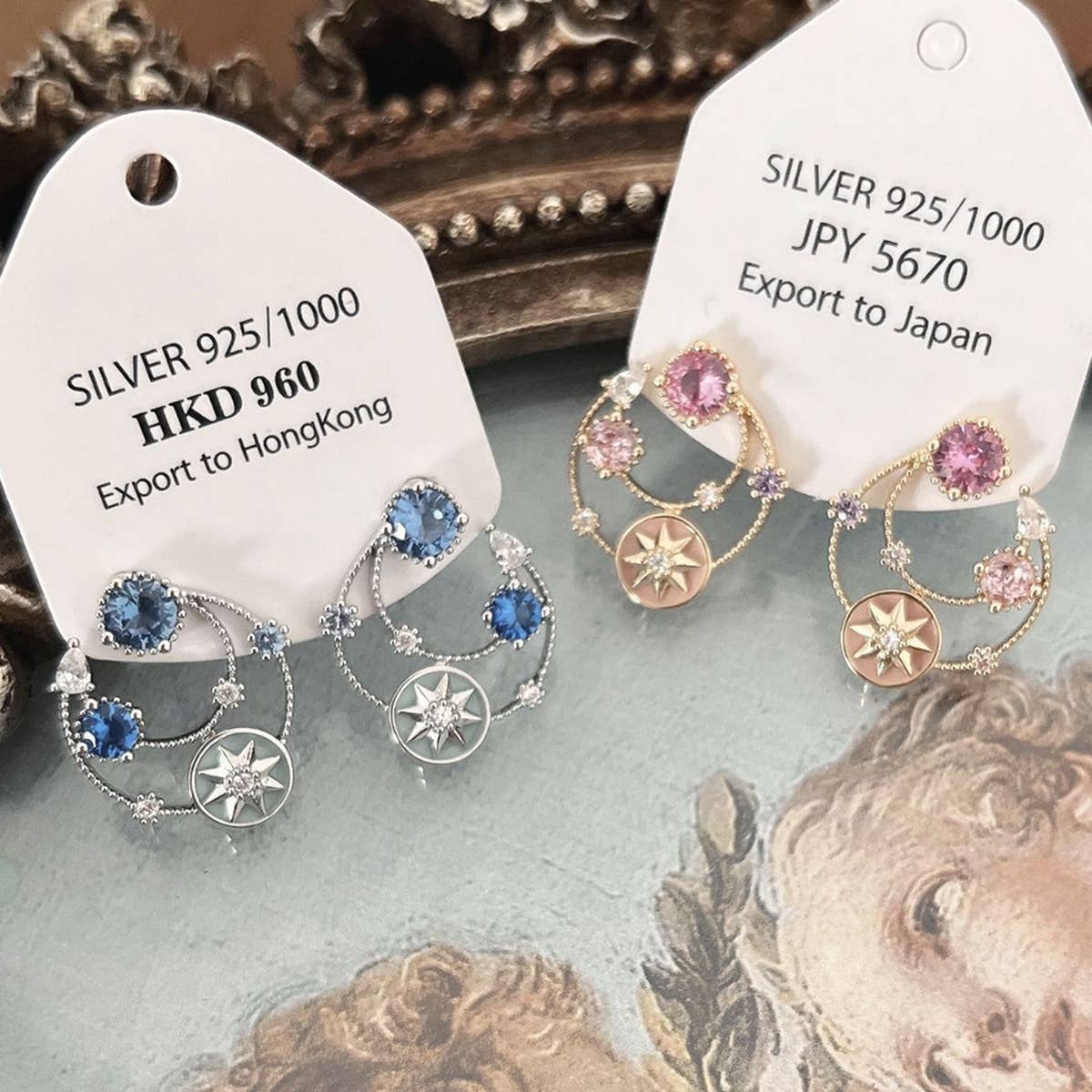 HOLLOW ZIRCON STAR EARRINGS