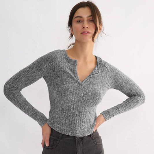 Form-Fitting And Versatile Knitted Sweater