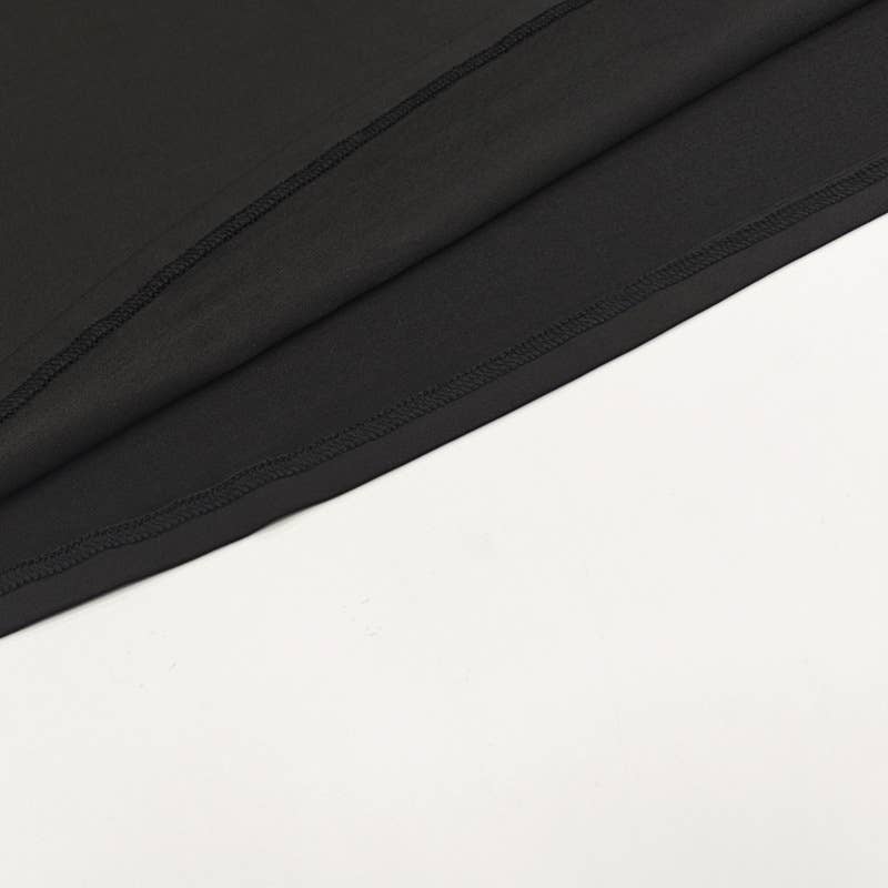 A cinched-neck backless and collared dress