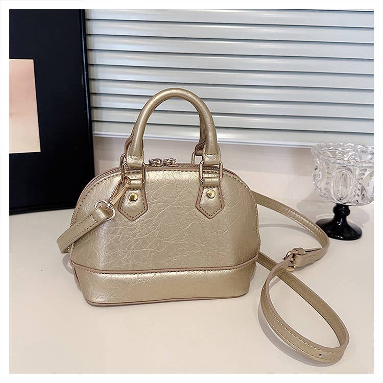 Fashionable riveted single-shoulder bag