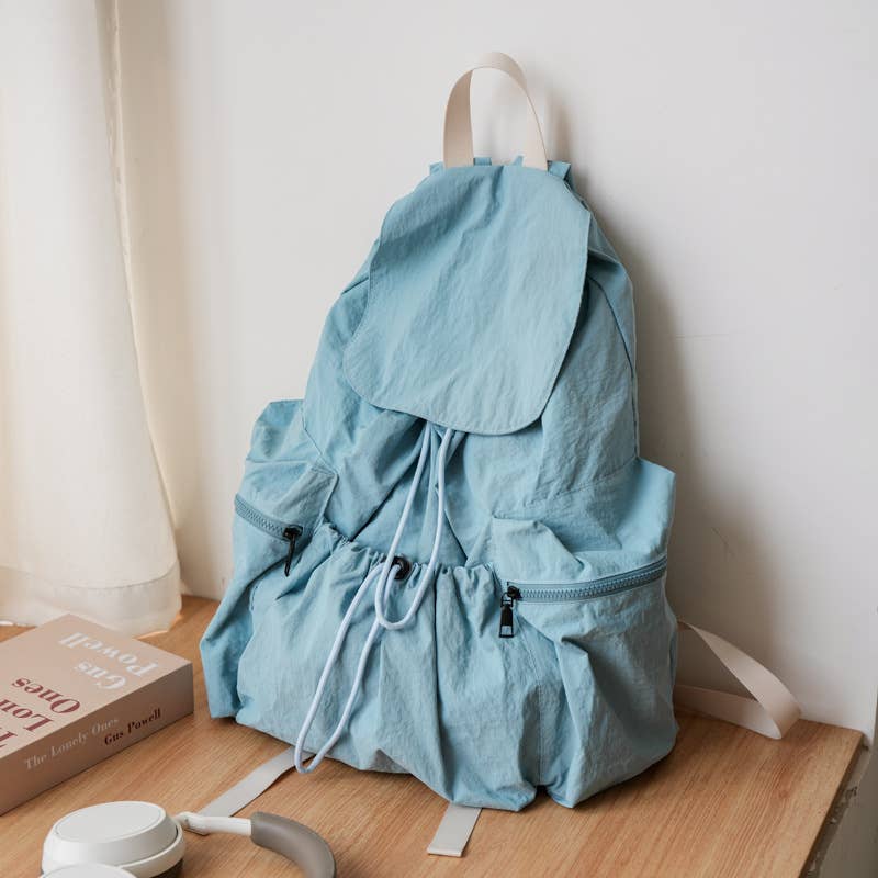 Fashionable pleated large-capacity flip schoolbag