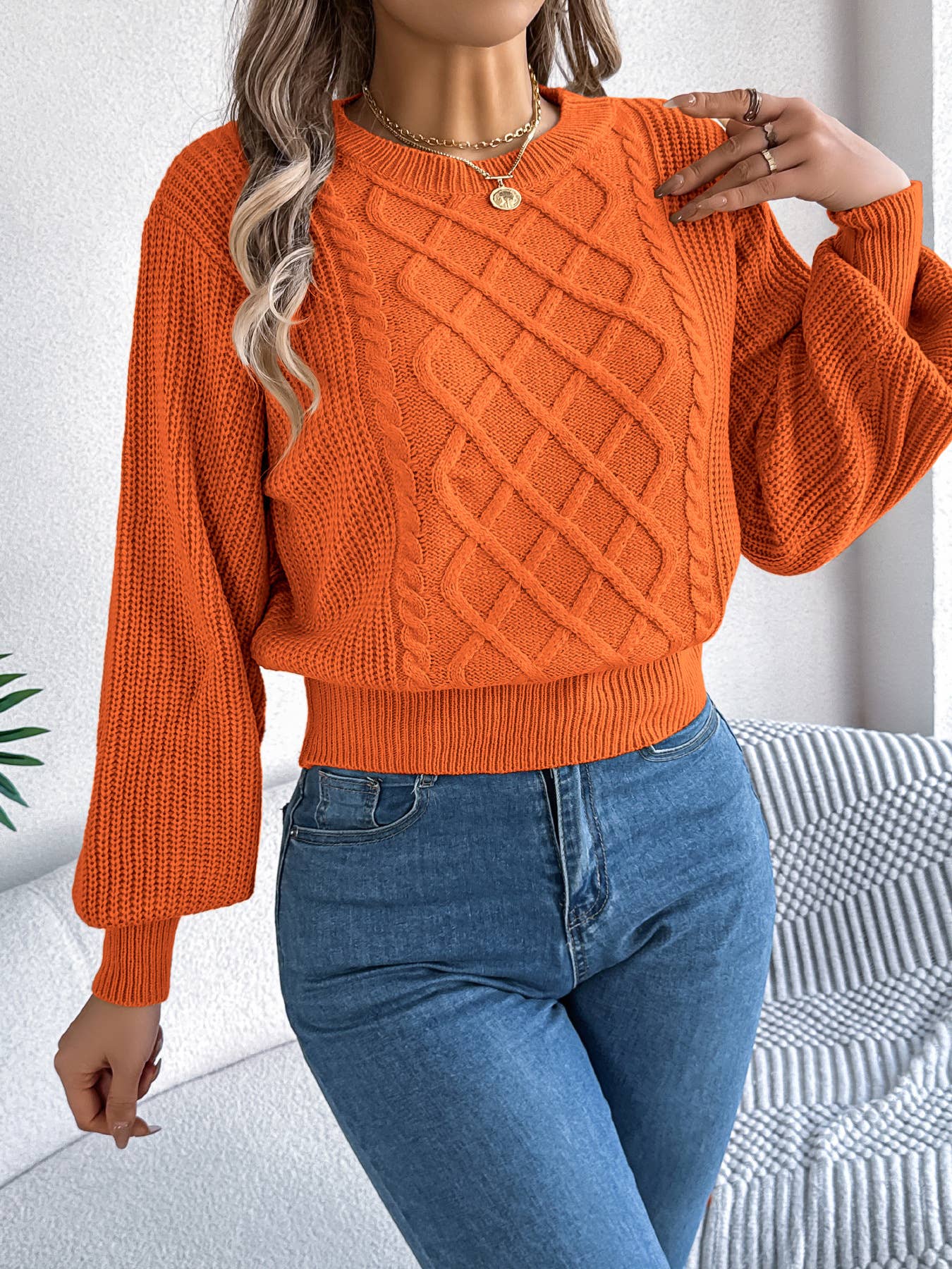 Lantern long-sleeved cinched-waist sweater