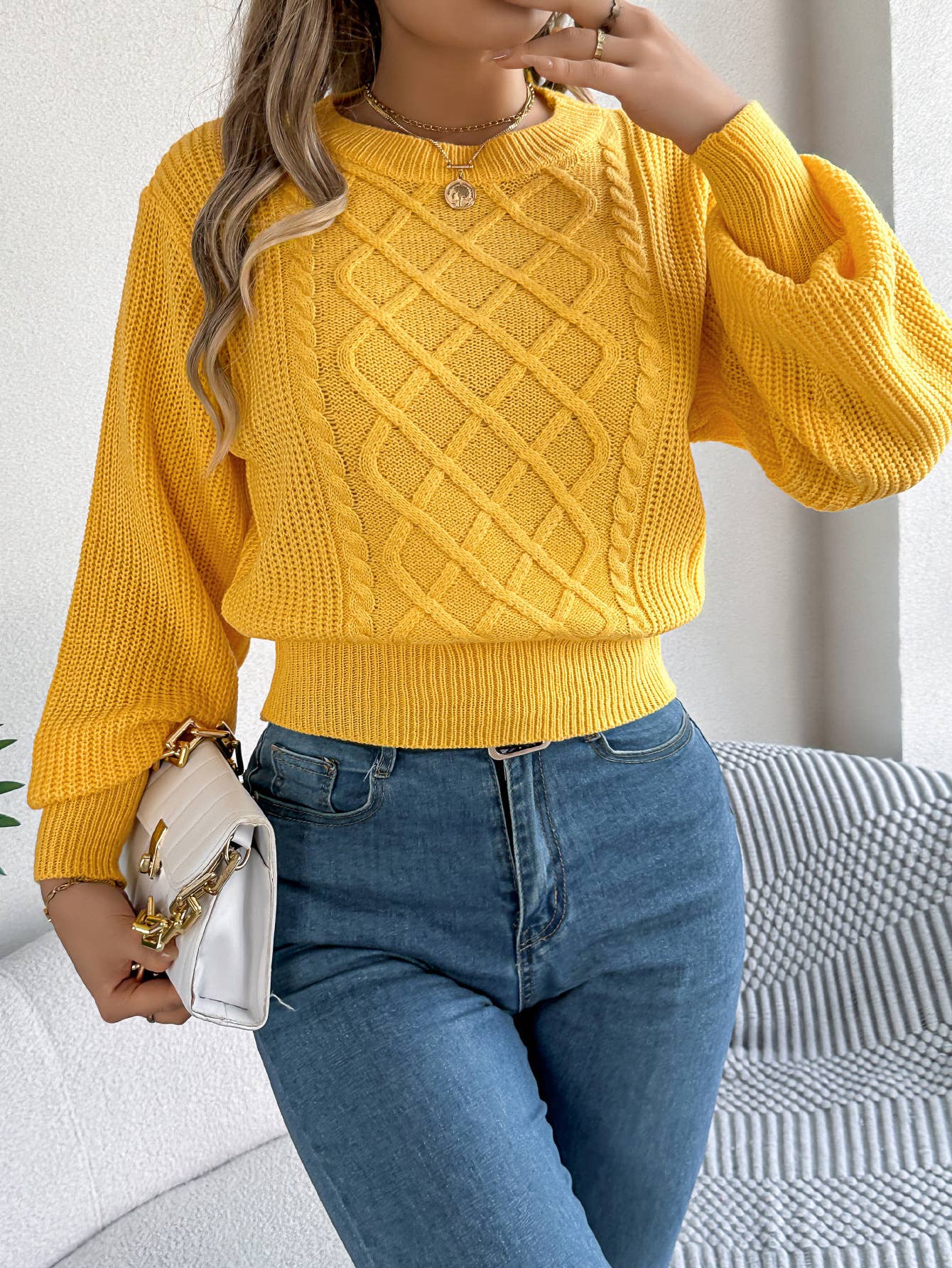 Lantern long-sleeved cinched-waist sweater