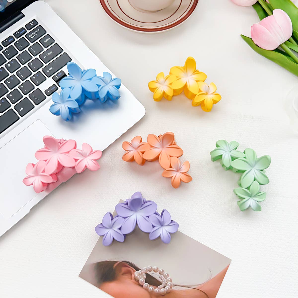 Candy-colored plastic hair clips with flowers
