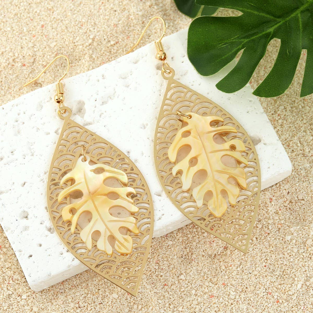 HOLLOW YELLOW SHELL LEAF CARVED EARRINGS