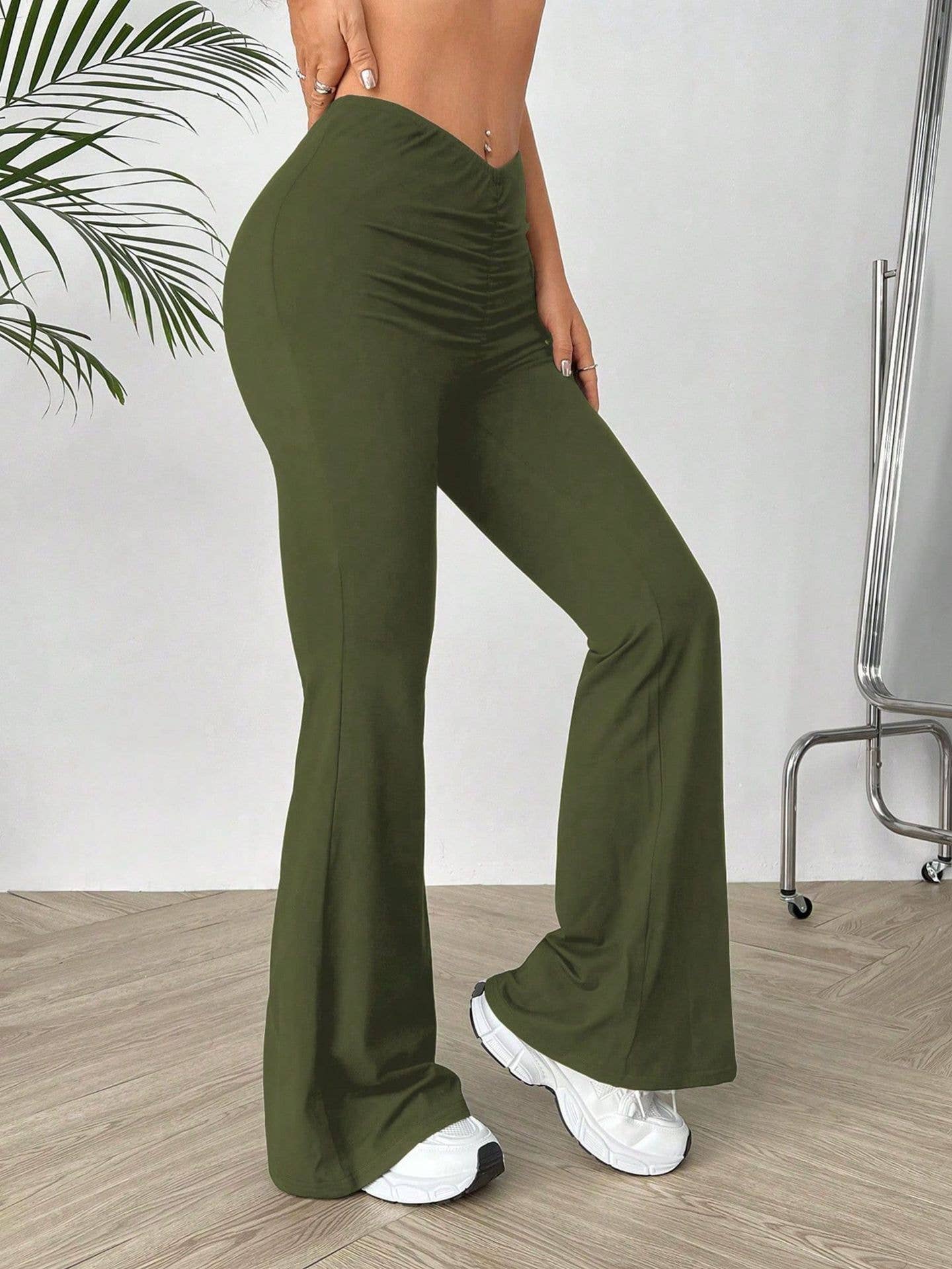 V-shaped waist slimming slightly flared trousers