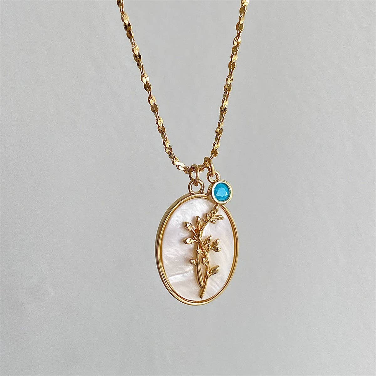 DECEMBER THREE-DIMENSIONAL FLORAL OVAL NECKLACE