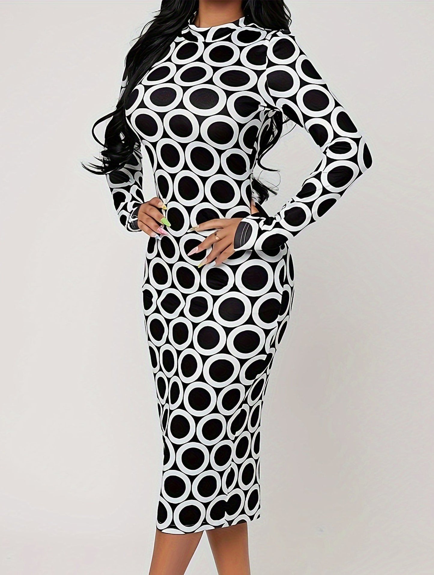 Hip-hugging polka-dot dress with back slits