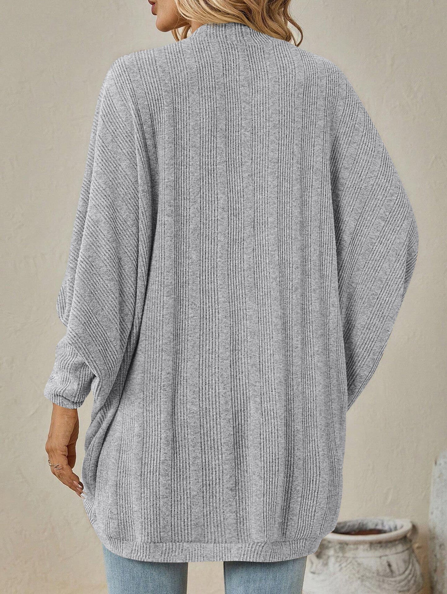 Solid color mid-length sweater