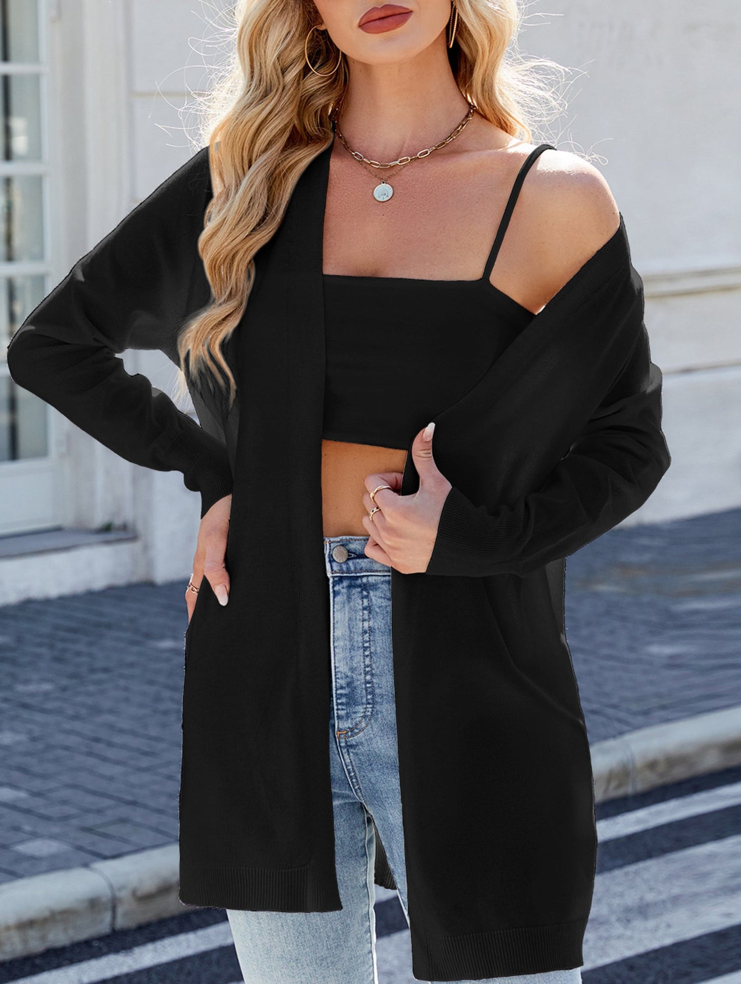 Long knitted striped cardigan sweater