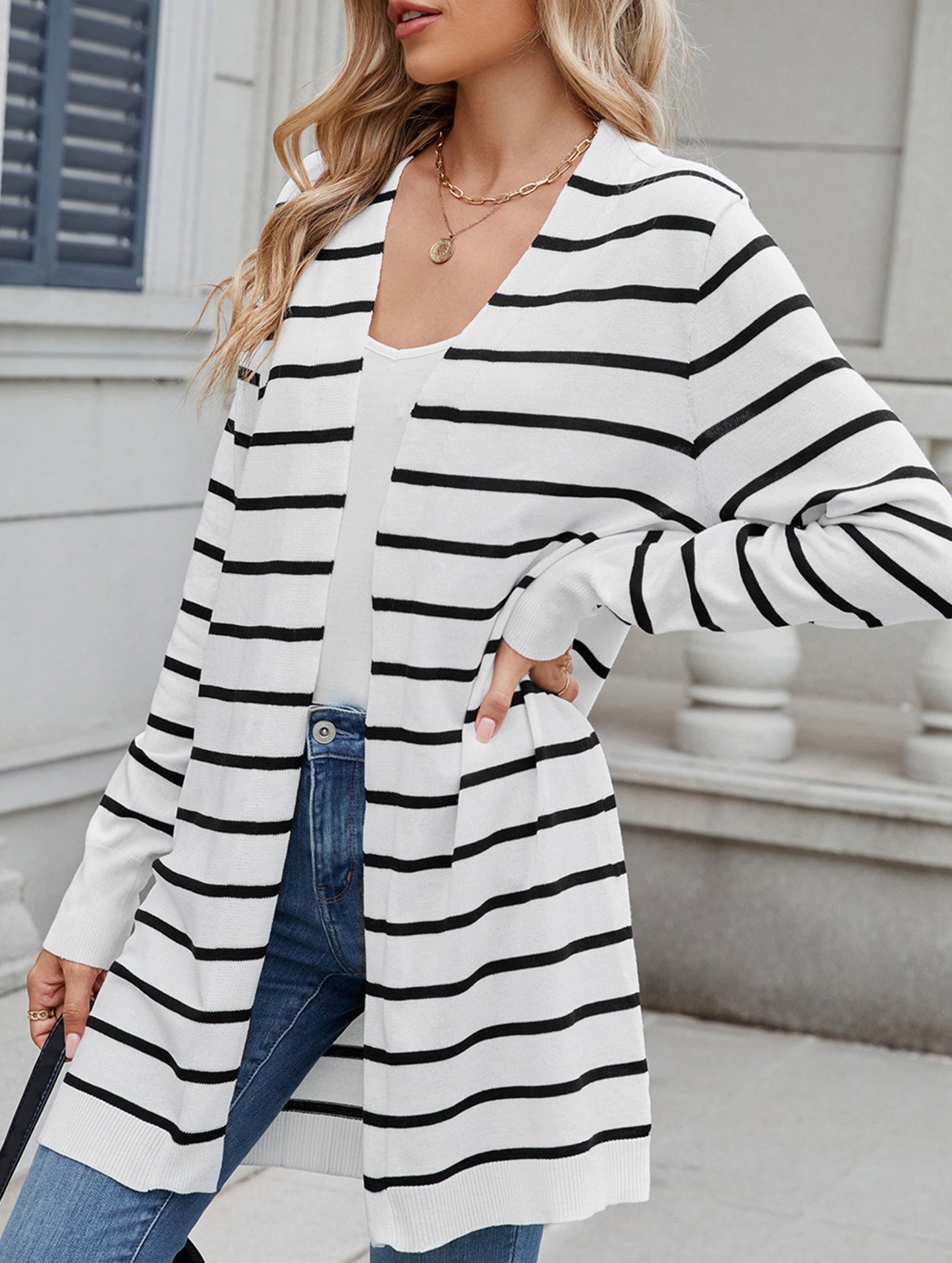 Long knitted striped cardigan sweater