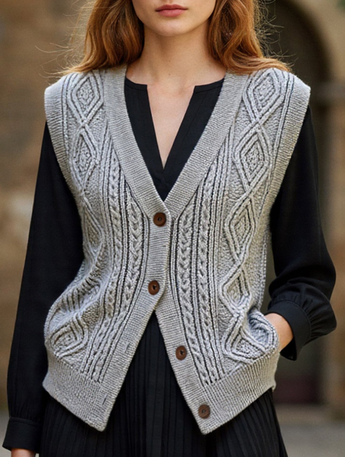 Knit vest with crisscross pattern