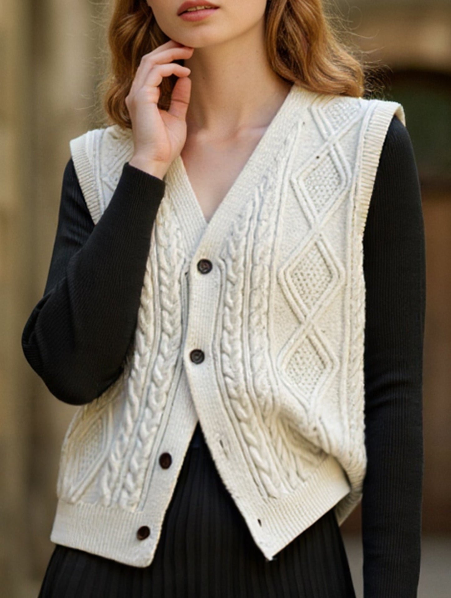 Knit vest with crisscross pattern