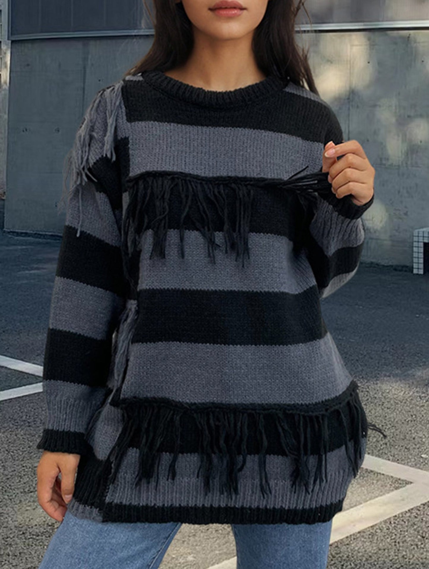 Color-blocked hand-knit tassel sweater