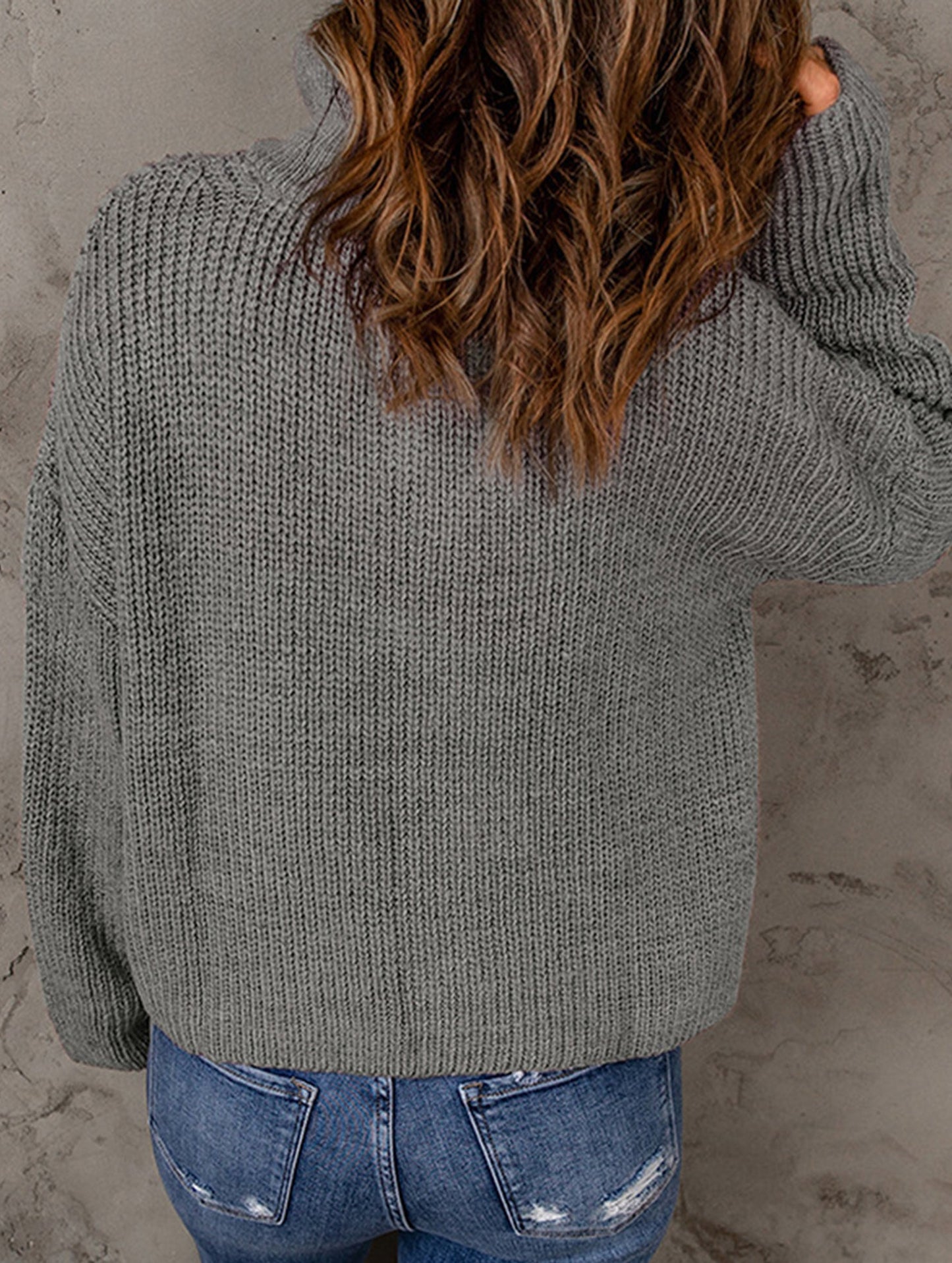 Loose high-neck ribbed pullover sweater