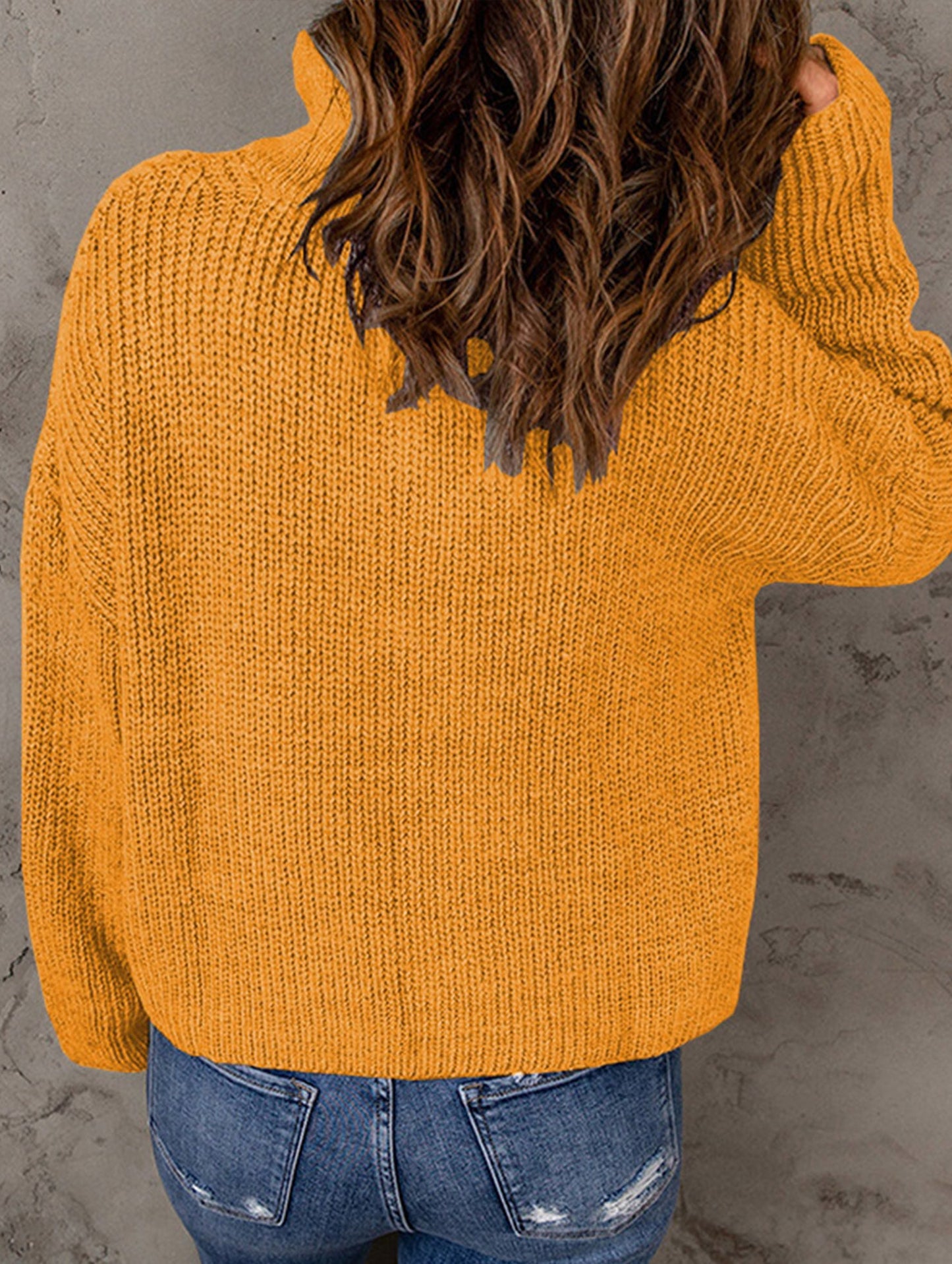 Loose high-neck ribbed pullover sweater