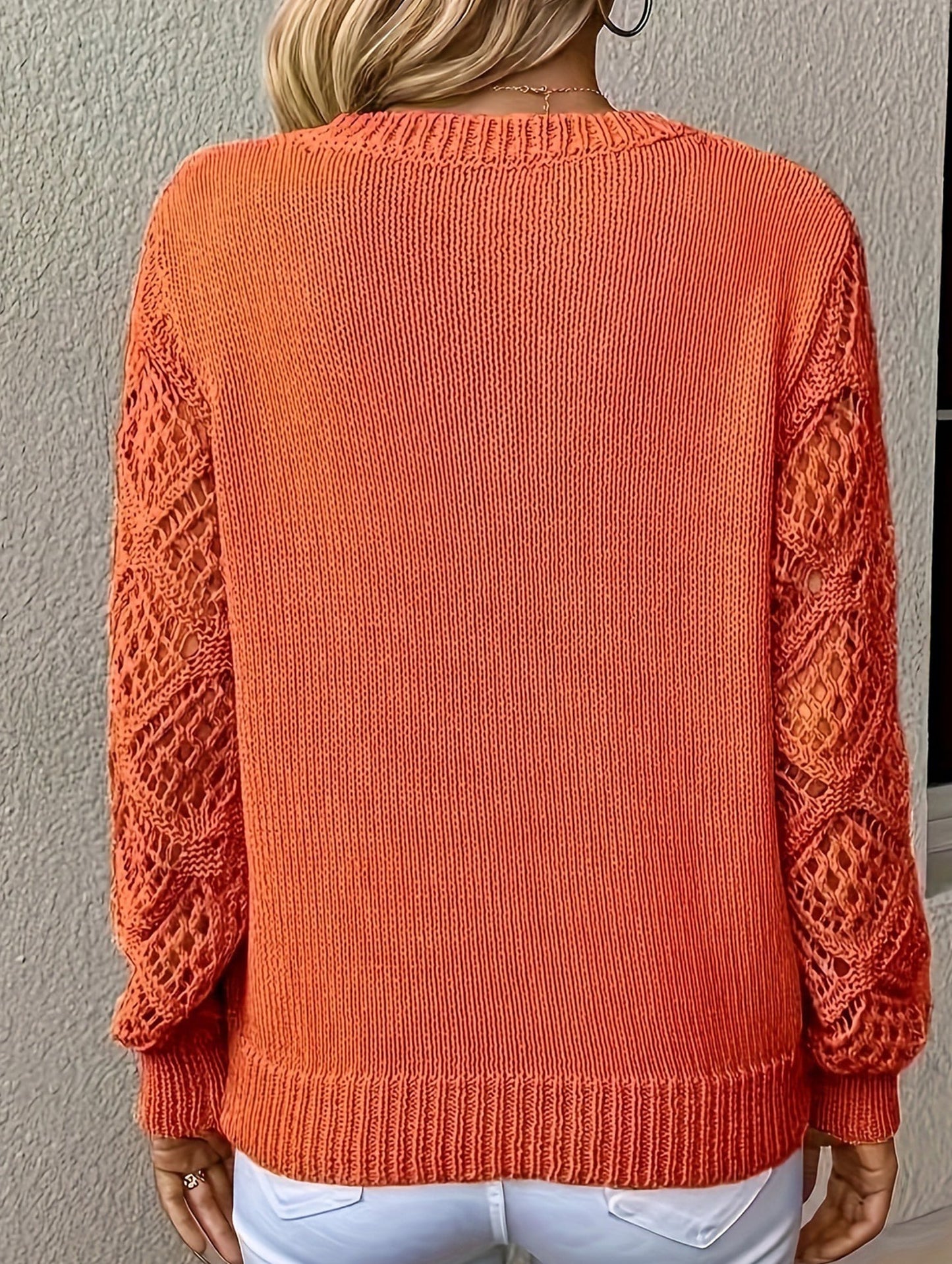 Loose V-neck hollow knit sweater