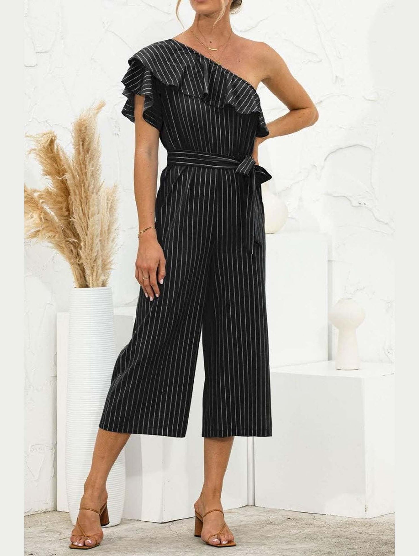 SLANTED SHOULDER RUFFLED STRIPED JUMPSUIT - Doublju