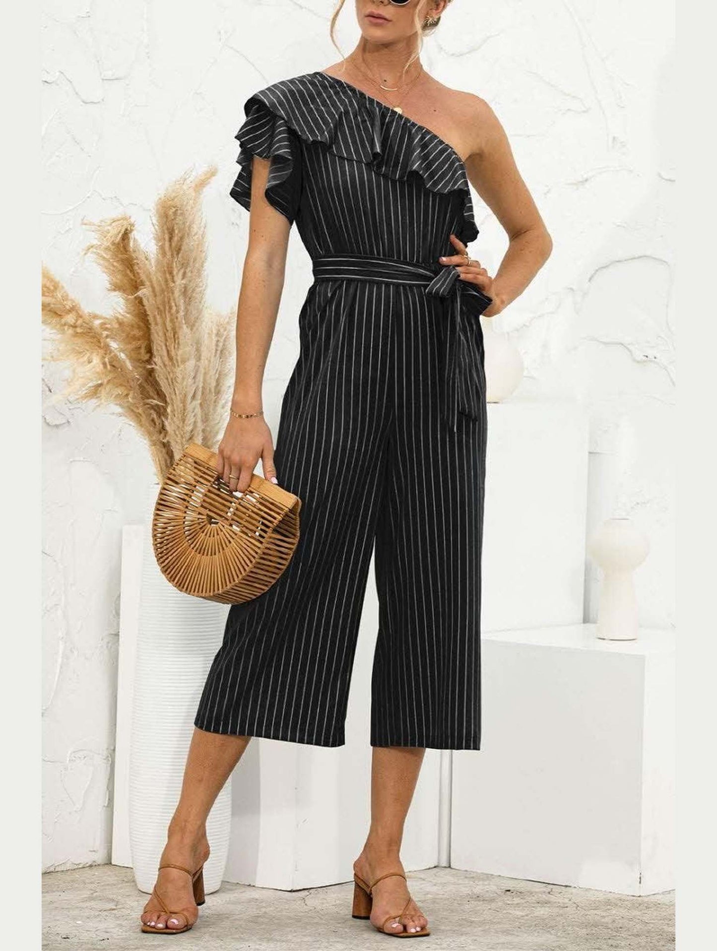 SLANTED SHOULDER RUFFLED STRIPED JUMPSUIT - Doublju
