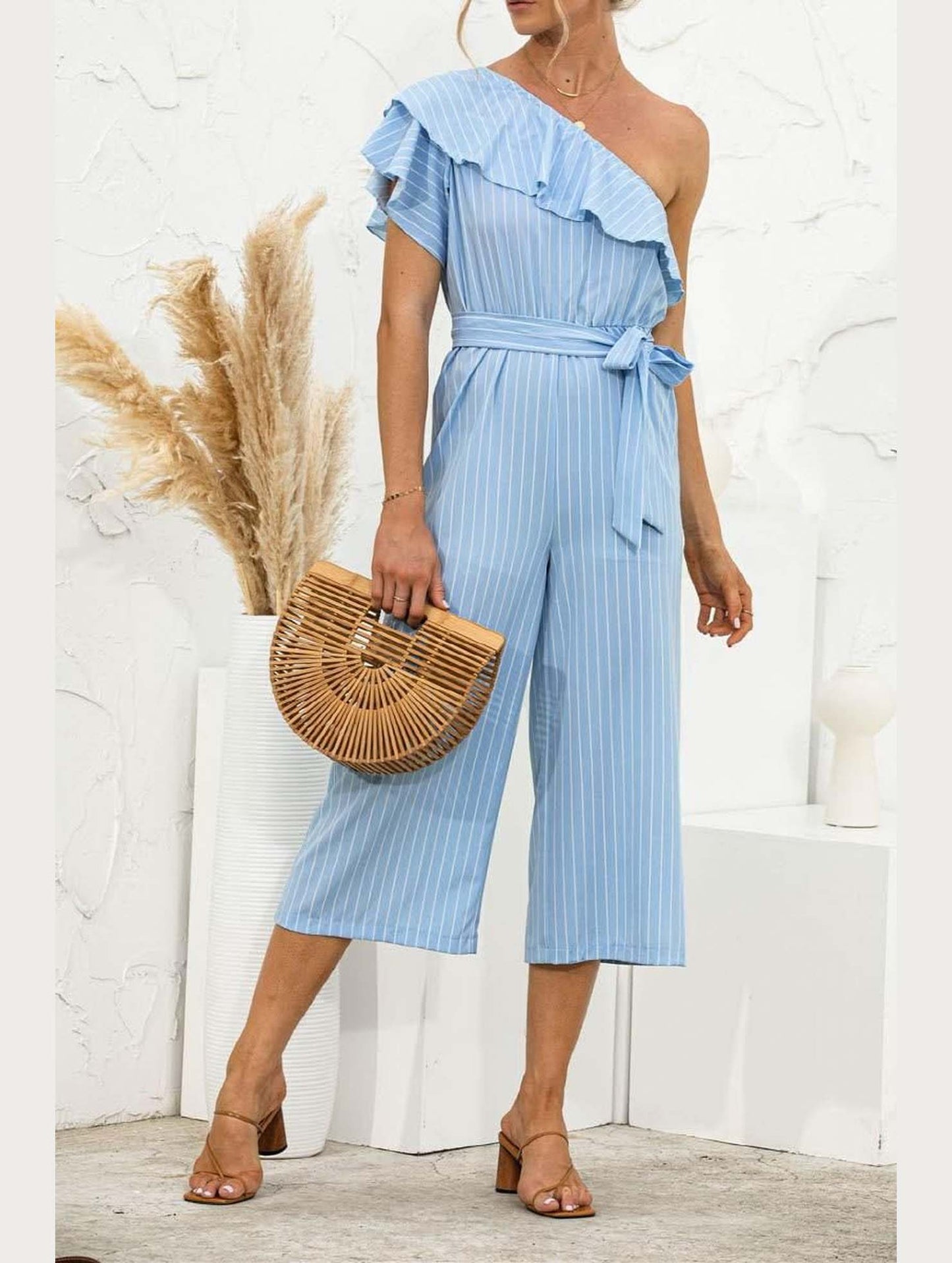 SLANTED SHOULDER RUFFLED STRIPED JUMPSUIT - Doublju